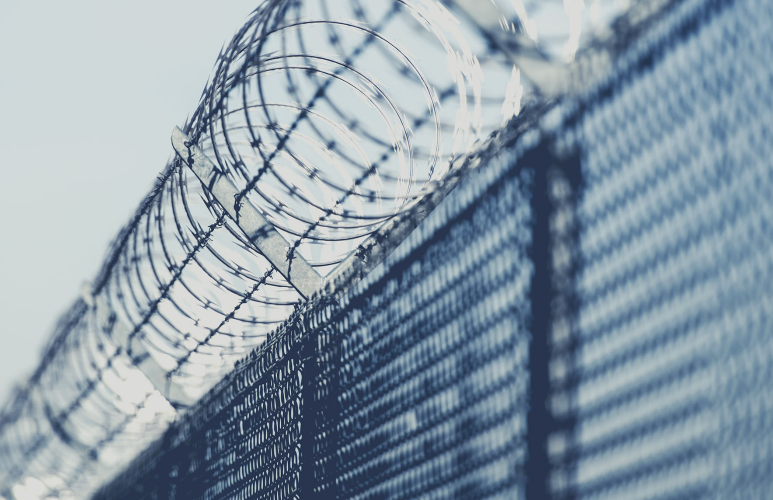 Suspect In CEO Murder Remains Jailed